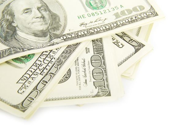 stack of money isolated on white background  iphotos