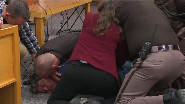 Father of victims tries to attack Larry Nassar in court Father of victims tries to attack Larry Nassar in court