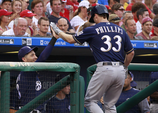 Brett Phillips crashes Craig Counsell's interview James Bond style