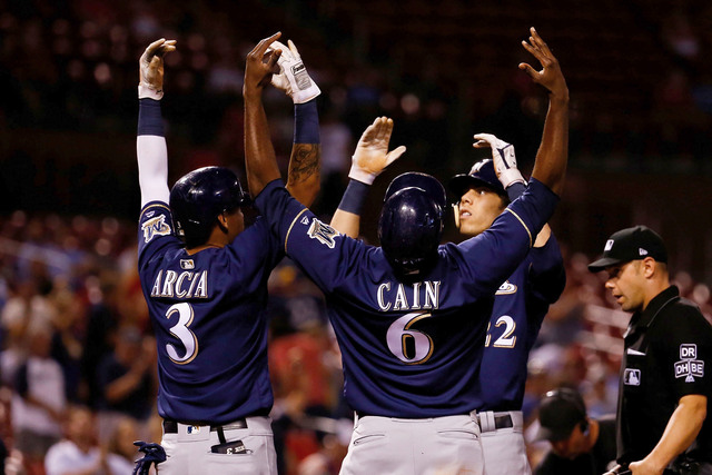 Yelich, Brewers dent Cards' playoff chances with 12-4 win